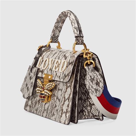 gucci snake morning robe|Gucci boutique bag.